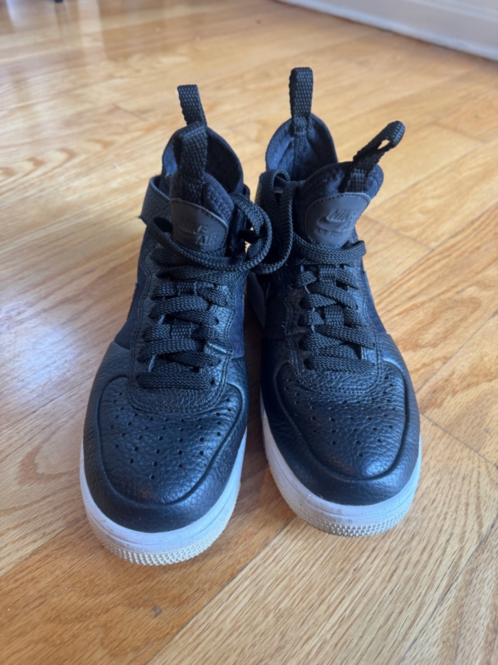 Nike Air Force Ones High Top Black Leather Sneakers with White Sole 6.5